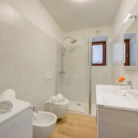 Red House: Beachfront Terrace & Private Beach - Happy Rentals Baveno